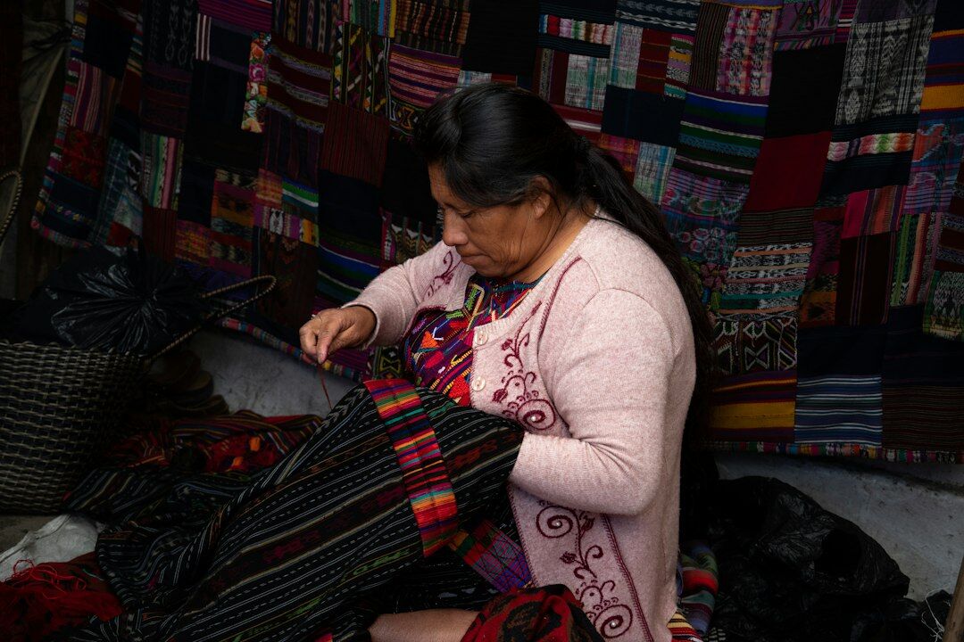 woman weaving traditional blanket