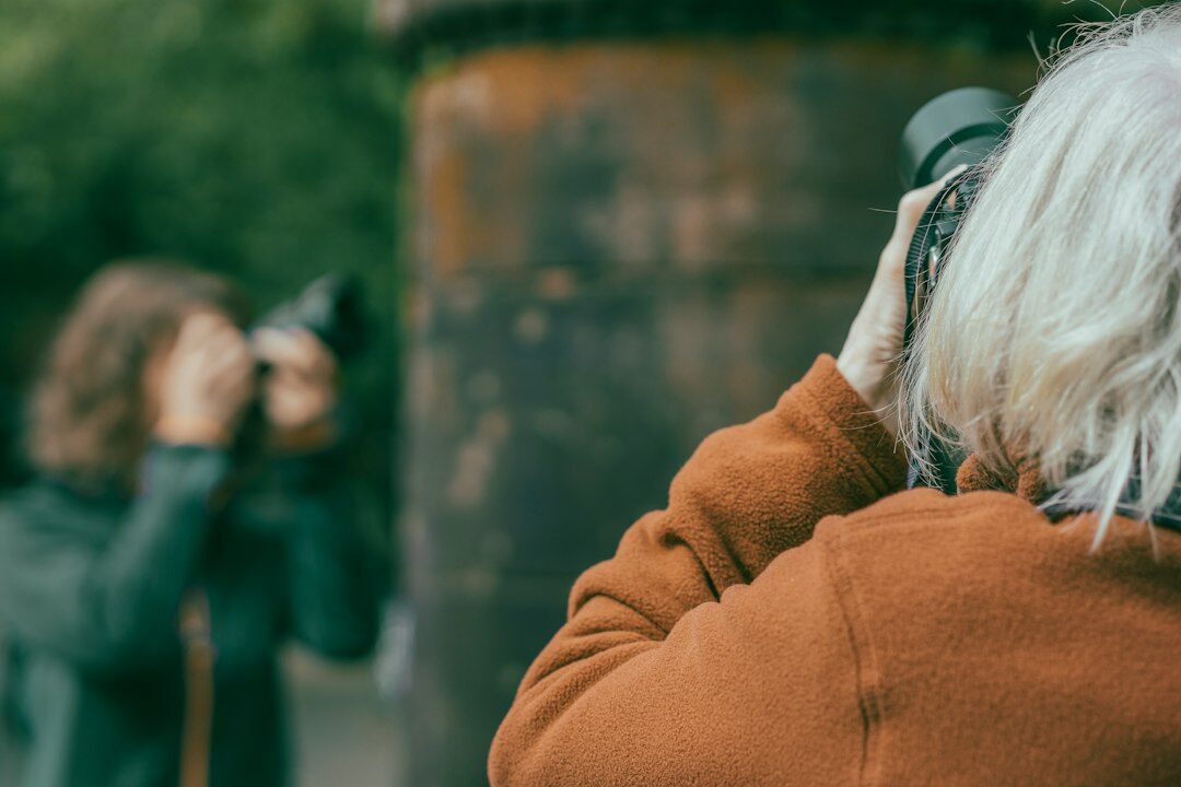 photographer interviewing elderly person