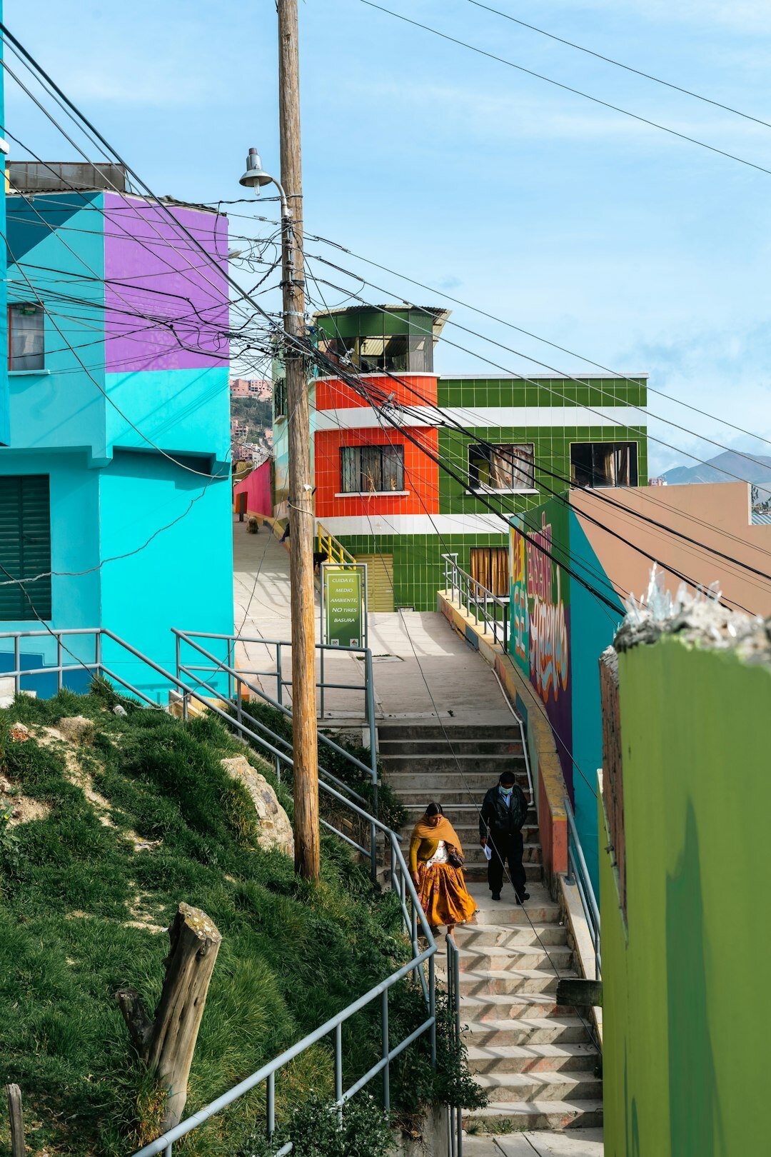 Colorful hillside houses stacked on a hill typical of a Chilean port city