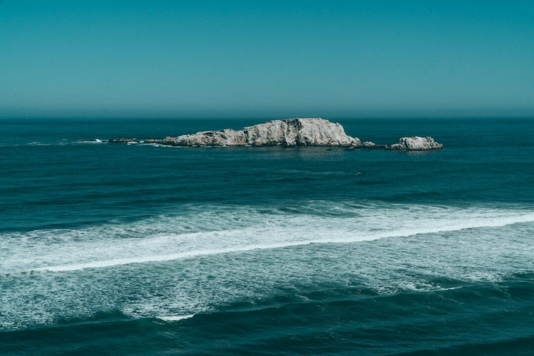 Rugged Chilean coastline with cliffs and ocean waves